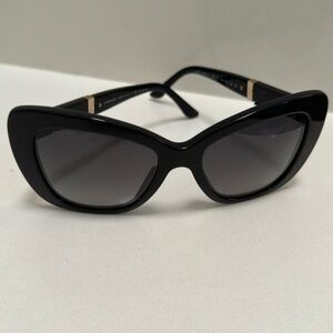 Versace glasses gently used